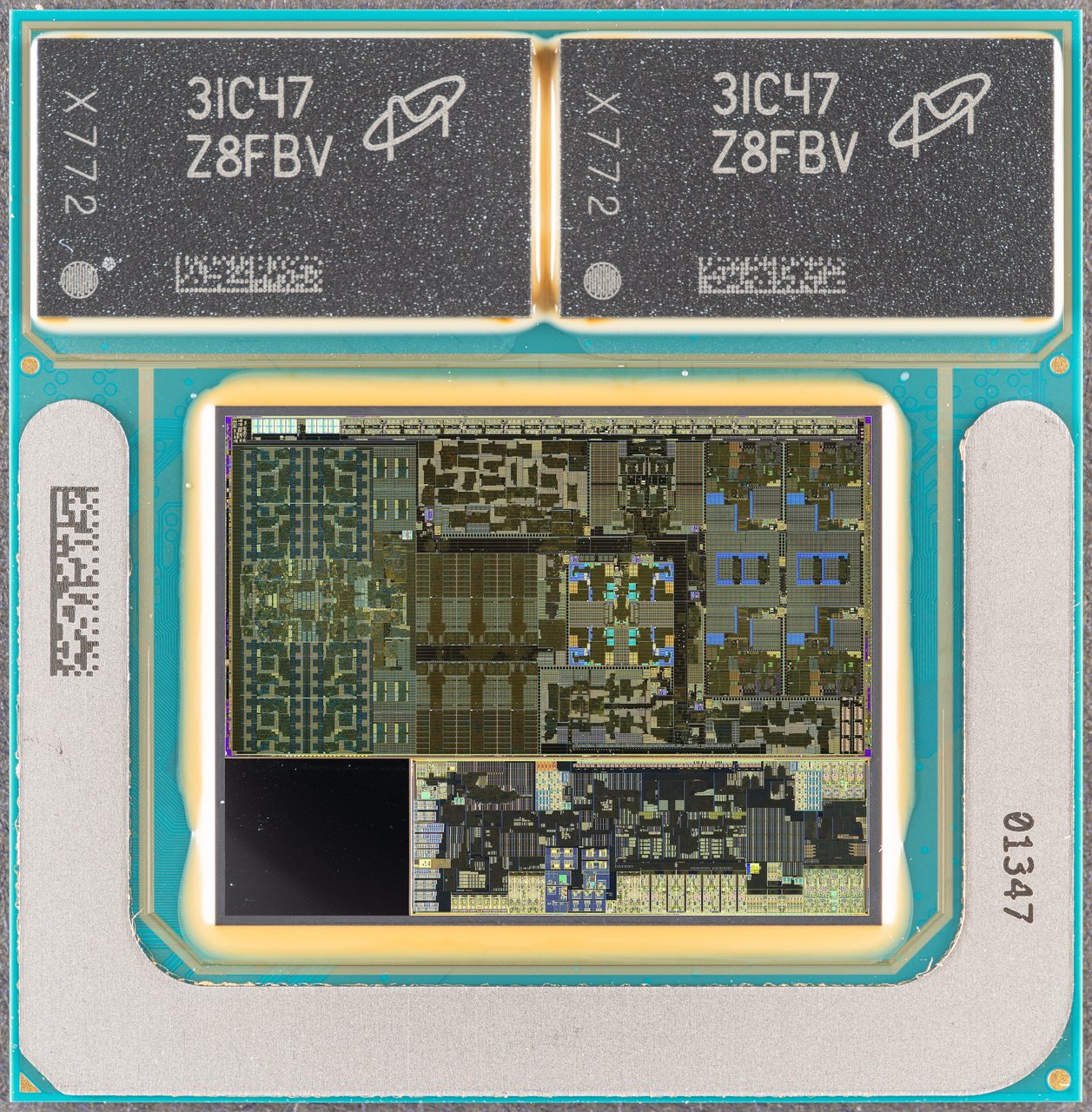 Photograph of an Intel Lunar Lake processor package from above: two rectangular memory chips with printed markings across the top, and below them a polished silicon die showing a patchwork of coloured circuit blocks, with a long narrow die and a plain dark square beneath it, all on a turquoise substrate